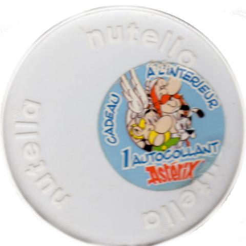 Bande Dessinée - Uderzo (Astérix) - Publicité - Albert UDERZO - Astérix - Nutella - Cadeau à l'intérieur, 1 autocollant Astérix - couvercle de pot avec sticker